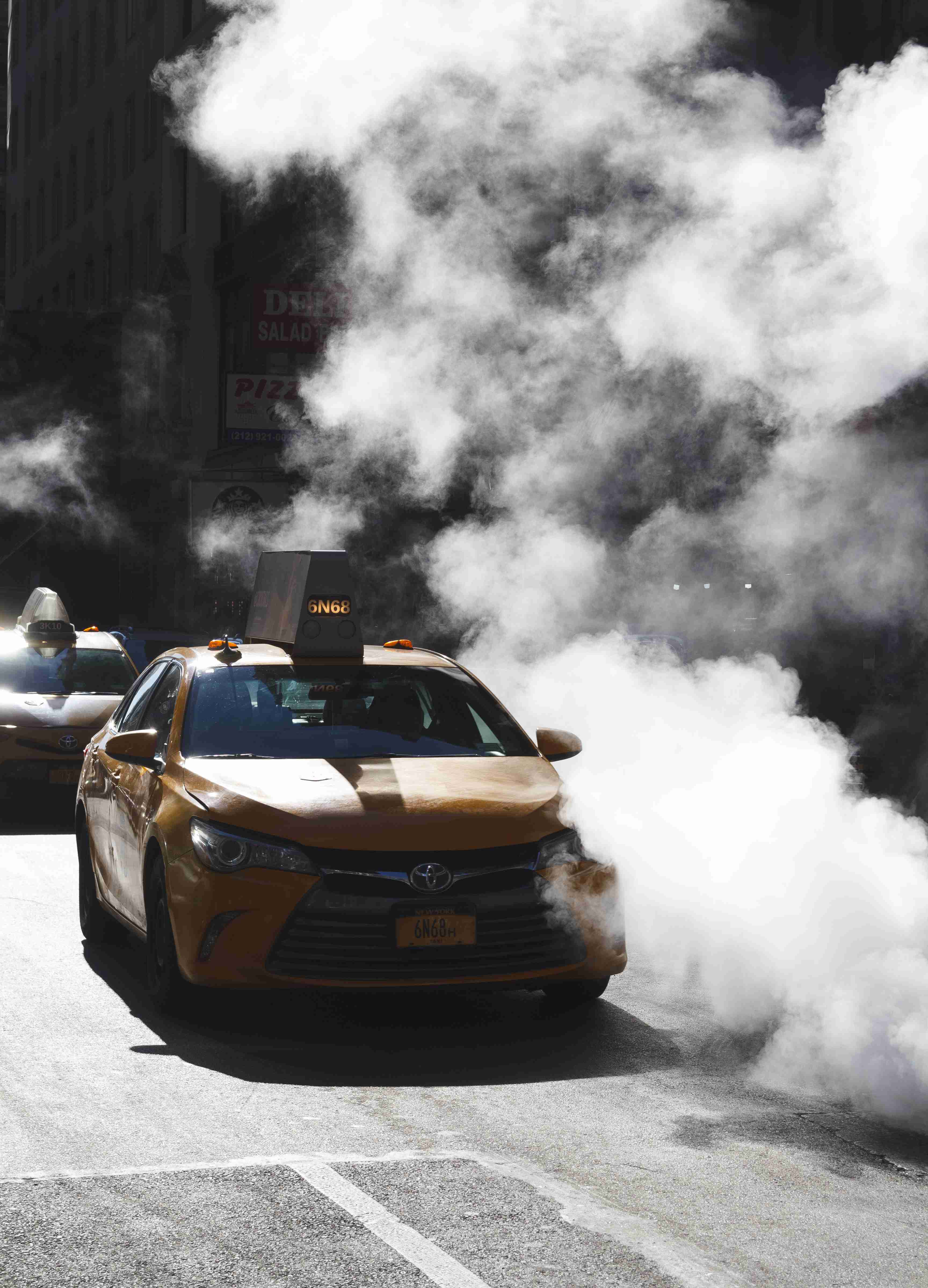 Taxi in steam, NYC.